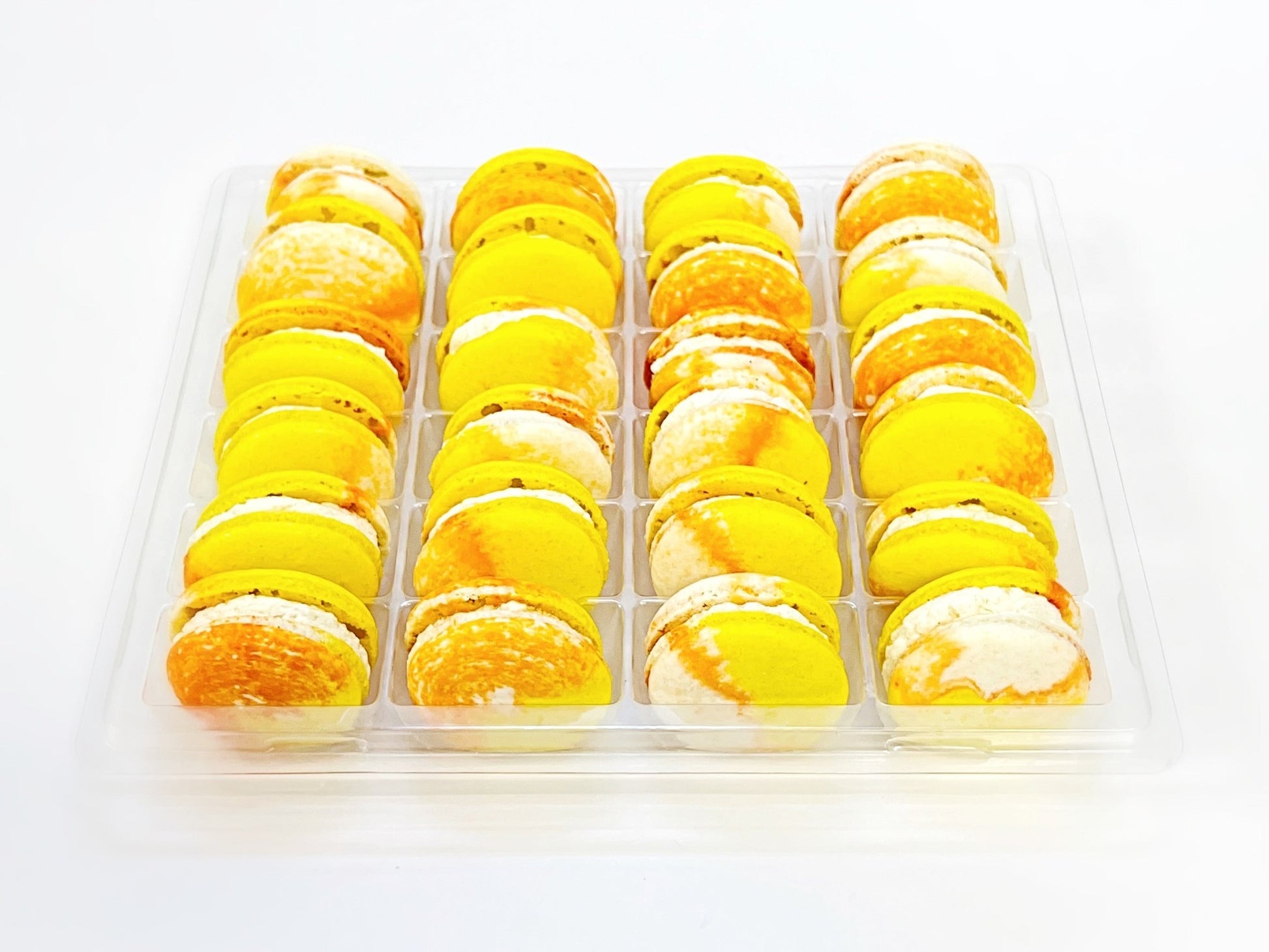 Wholesale Lemon Cheesecake Vegan Macarons | Available in 24 & 48 Pack | A great addition for your bakery establishment or your next party - Macaron Centrale24 Pack