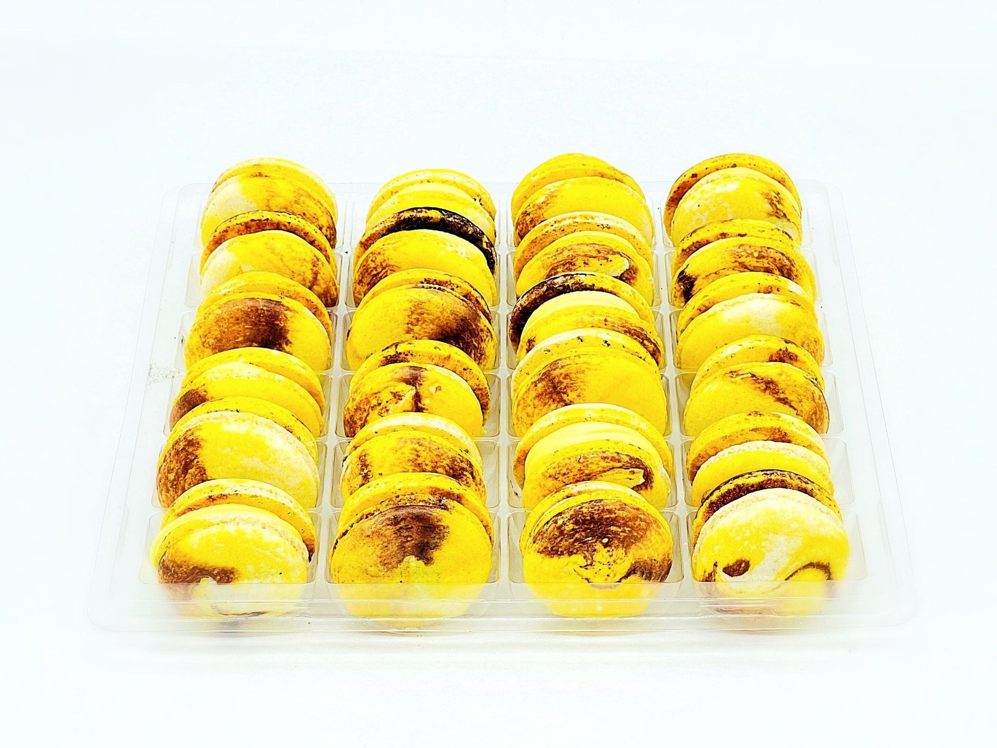 Wholesale Yellow Planet (Lemon Chocolate) Vegan Macarons | Available in 24 & 48 Pack - Macaron Centrale24 Pack